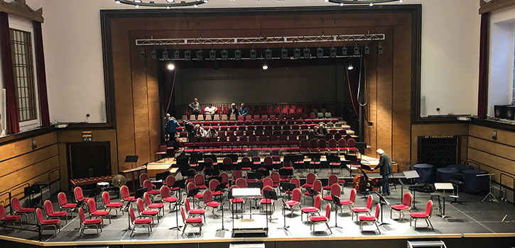 Stage set with seating for orchestra 